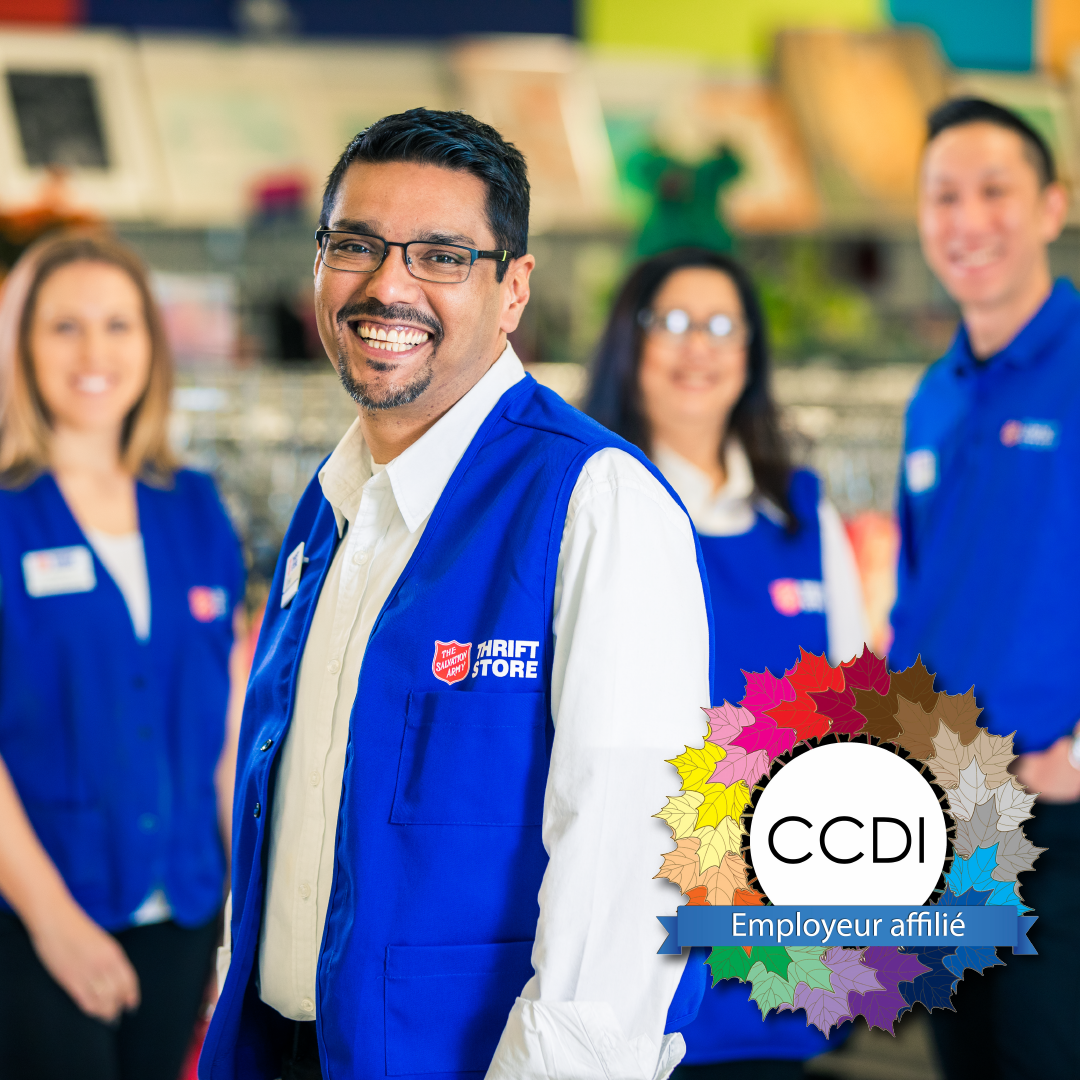 Thrift Store employees standing together with CCDI logo