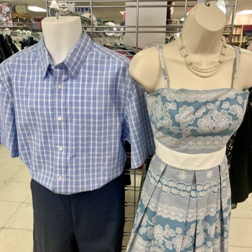 Pastel palette blue dress and shirt on mannequins