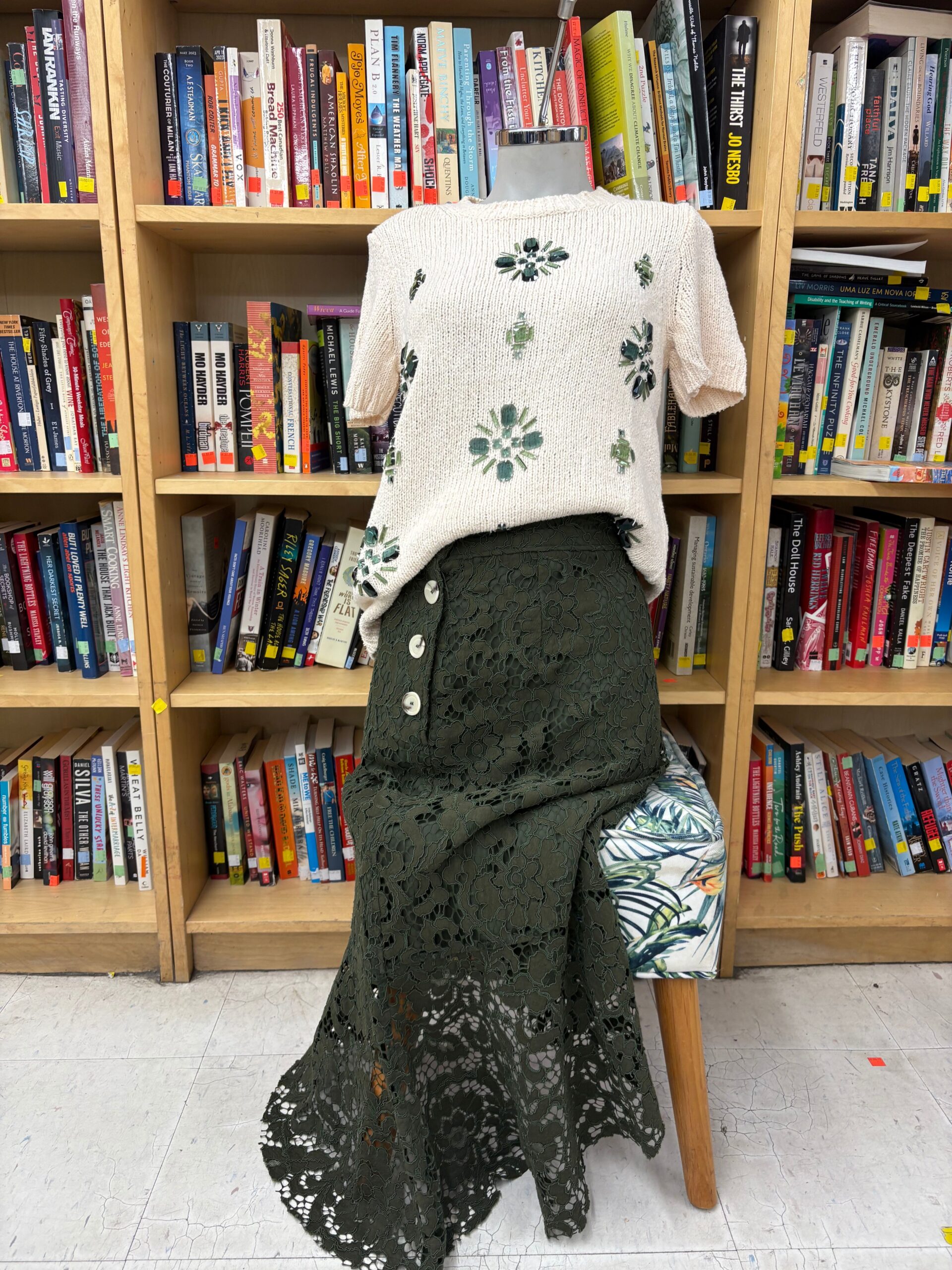 white short sleeve sweater and long green skirt