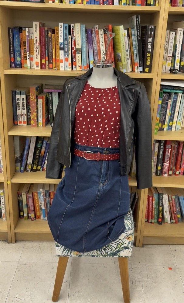leather coat, red top, ad jean skirt